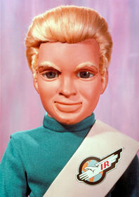 Alan Tracy puppet with green turtleneck Robert Reed look-a-like