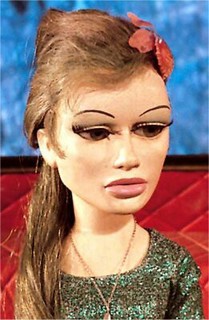 Marina puppet flower in hair Briggitte Bardot look-a-like