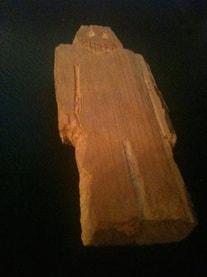 The ominous wooden man. The Dream Dilemma