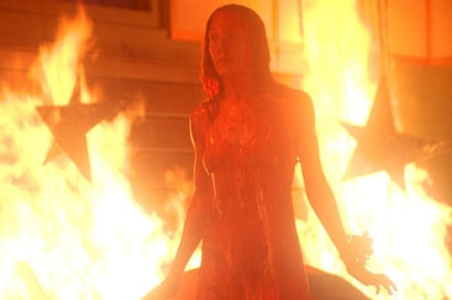 Carrie walking through fire