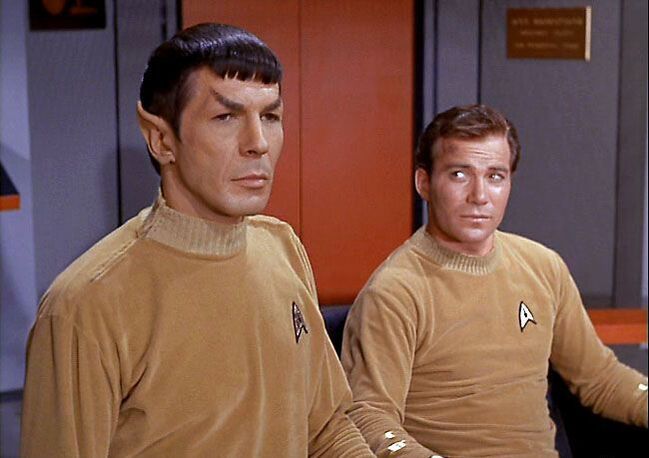 Kirk and Spock. Two star fleet officers on Enterprise bridge