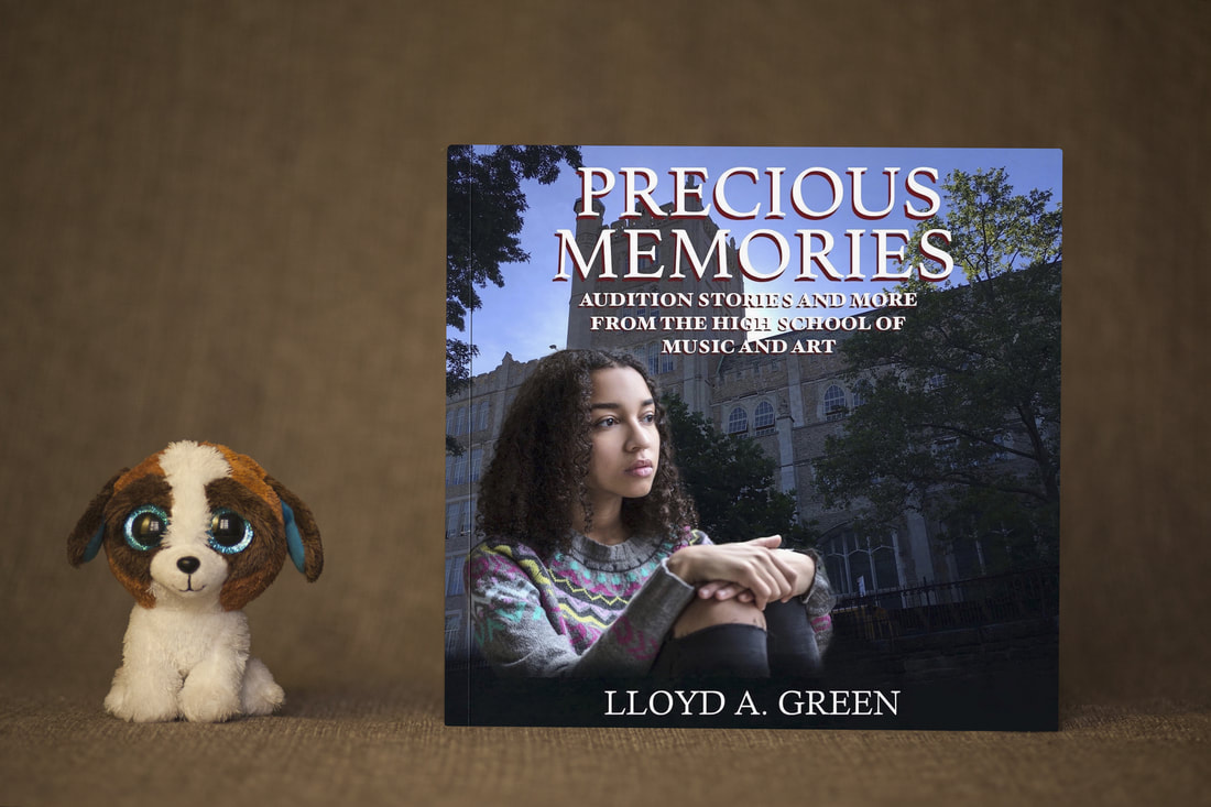 Precious Memories book next to little stuffed doggie 